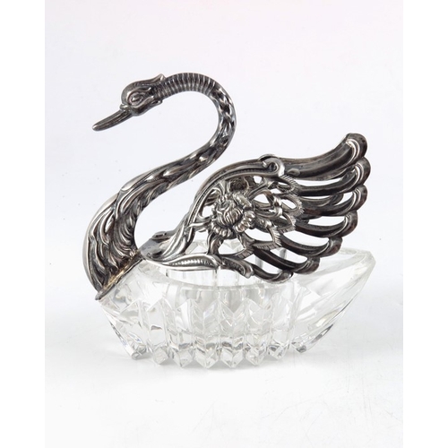 33 - A Continental silver and glass swan bowl, E Ltd., London import marks 1981, cut glass body and pierc... 