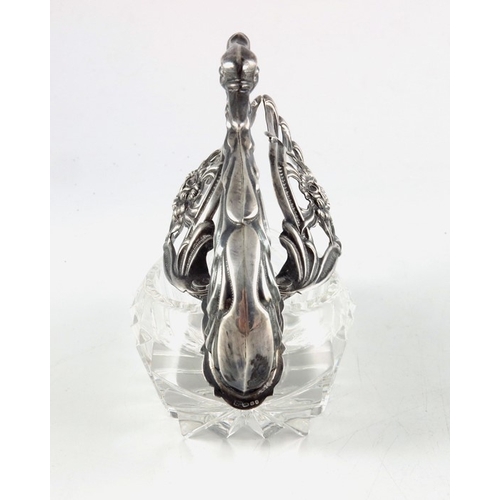 33 - A Continental silver and glass swan bowl, E Ltd., London import marks 1981, cut glass body and pierc... 