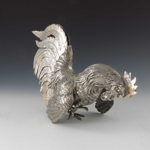 37 - A pair of Italian silver gilt cockerel figures, ML, cast and chased realistically, modelled fighting... 