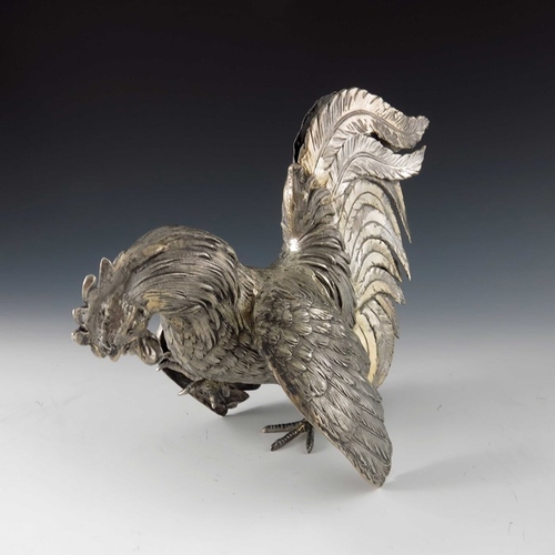 37 - A pair of Italian silver gilt cockerel figures, ML, cast and chased realistically, modelled fighting... 