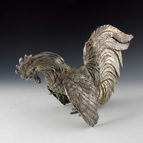 37 - A pair of Italian silver gilt cockerel figures, ML, cast and chased realistically, modelled fighting... 