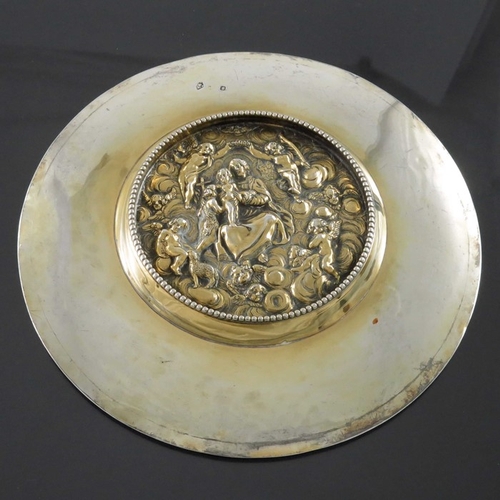 60 - A French Napoleonic silver and parcel gilt paten, QB, circa 1810, the top of plain broad rimmed form... 