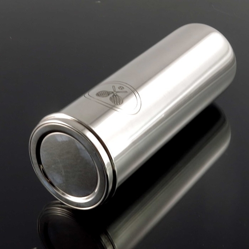 62 - A silver tennis ball tube, Tiffany and Co., import marks London 1997, cylindrical form etched with c... 