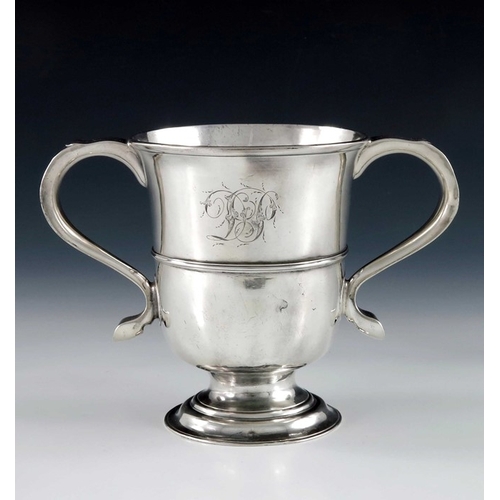 71 - A George III Provincial silver twin handled cup, John Langlands, Newcastle circa 1760s, footed urn f... 