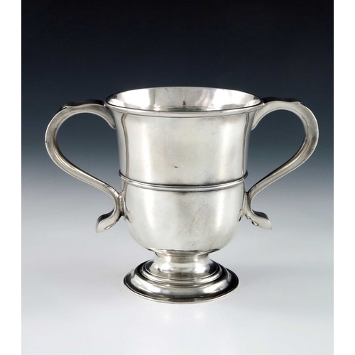 71 - A George III Provincial silver twin handled cup, John Langlands, Newcastle circa 1760s, footed urn f... 