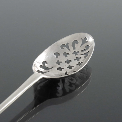 88 - A George II silver mote spoon, Richard Pargeter, London circa 1740, the honeysuckle back bowl pierce... 