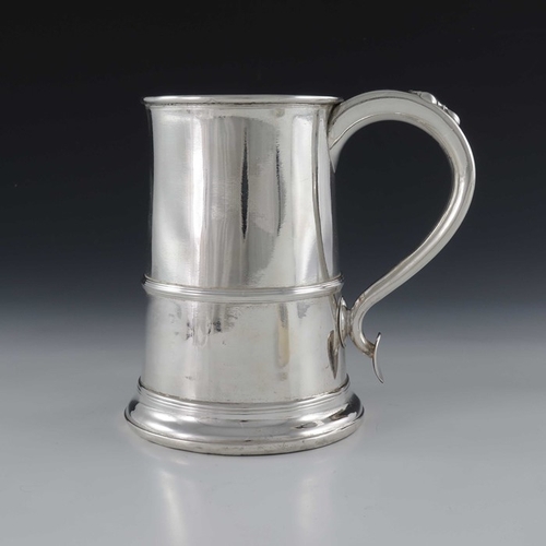 99 - A George II Old Sheffield Plate tankard, circa 1750, banded conical form, turned wooden base and hol... 