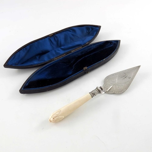 102 - A Victorian silver plated and carved ivory handled butter trowel, circa 1880, the blade engraved wit... 