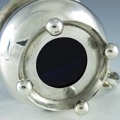 106 - Charles Stuart Harris, London 1902, an Edwardian silver mustard pot, double ogee ovoid form, on four... 