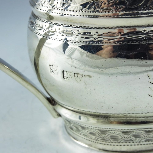 107 - Nathan and Hayes, Chester 1905, an Edwardian silver mustard pot, ogee moulded oval form, bright cut ... 