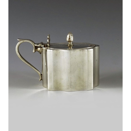 108 - Charles Perry and Co., Chester 1930, a George V silver mustard pot, straight sided ogee fluted recta... 