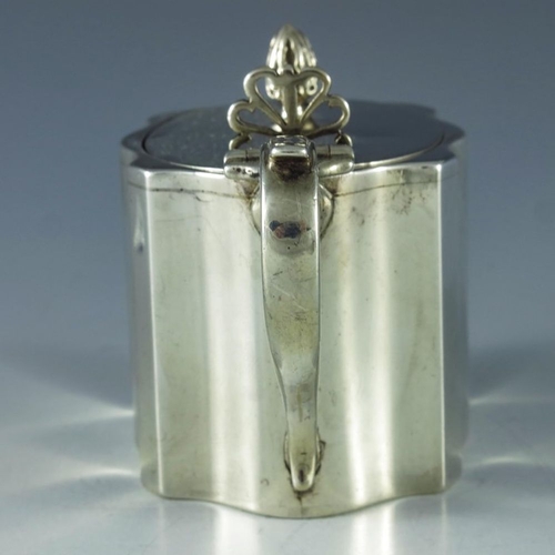 108 - Charles Perry and Co., Chester 1930, a George V silver mustard pot, straight sided ogee fluted recta... 