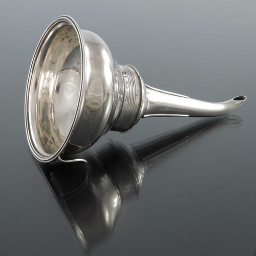 113 - A George III silver wine funnel, James Mince, London 1804, ogee strainer with reeded rim, 14.5cm hig... 