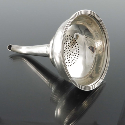 118 - A George III silver wine funnel, Thomas Meriton, London 1800, plain form with fluted banding, detach... 