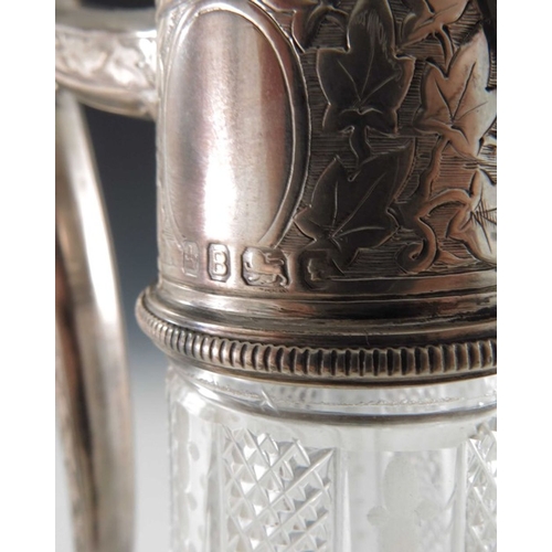 119 - A Victorian silver mounted glass claret jug, Atkin Brothers, Sheffield 1869, tapered and angled balu... 