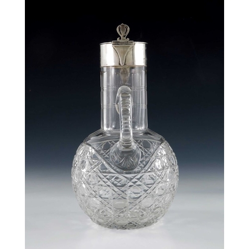 120 - A George V silver mounted cut glass claret jug, Robert Pringle, London 1914, the globe body with hob... 