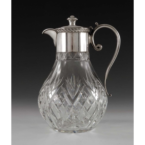 121 - An Elizabeth II silver mounted cut glass claret jug, F G Flavell, Birmingham 1979, the bulbous body ... 