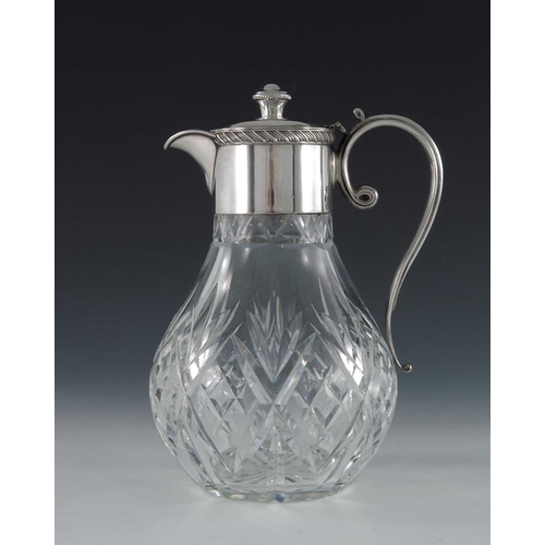 121 - An Elizabeth II silver mounted cut glass claret jug, F G Flavell, Birmingham 1979, the bulbous body ... 