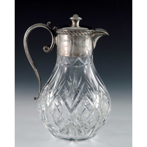 121 - An Elizabeth II silver mounted cut glass claret jug, F G Flavell, Birmingham 1979, the bulbous body ... 