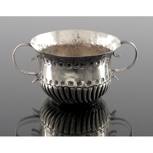 124 - A Queen Anne miniature silver porringer, Benjamin Bentley, London circa 1705, twin handled ogee form... 