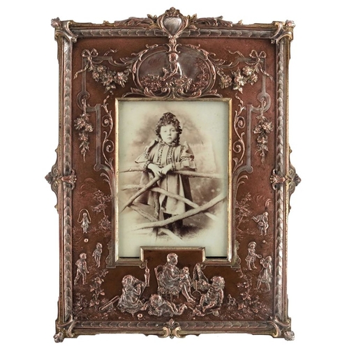 126 - A Victorian silver plated electrotype photo frame, probably Elkington and Co., circa 1890, modelled ... 