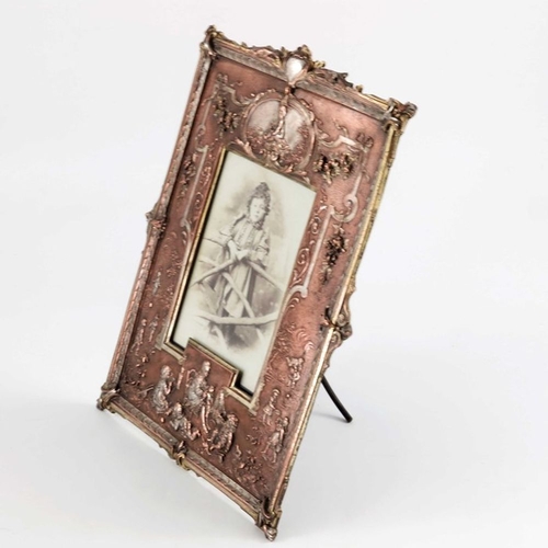 126 - A Victorian silver plated electrotype photo frame, probably Elkington and Co., circa 1890, modelled ... 