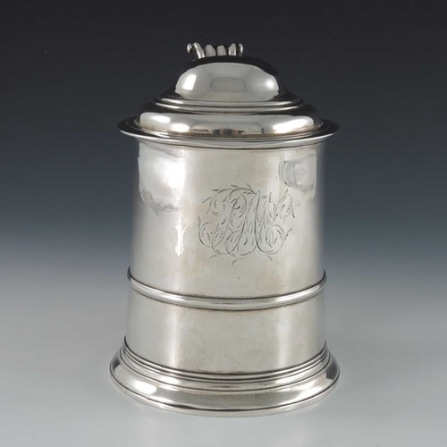 129 - A George II silver lidded tankard, Sarah Parr, London 1732, banded cylindrical form on stepped foot,... 