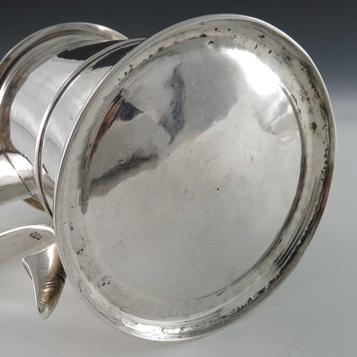 129 - A George II silver lidded tankard, Sarah Parr, London 1732, banded cylindrical form on stepped foot,... 