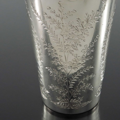 133 - A Victorian silver beaker, Walter and John Barnard, London 1890, conical form, chased and engraved w... 