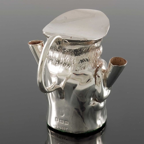 155 - A George V novelty silver cigar table lighter, Birmingham 1911, modelled as a Toby jug with handle, ... 