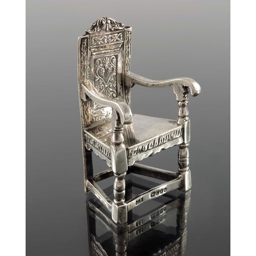 162 - A Victorian silver miniature chair, John Smith, London 1898, modelled as Shakespeare's armchair, Ger... 