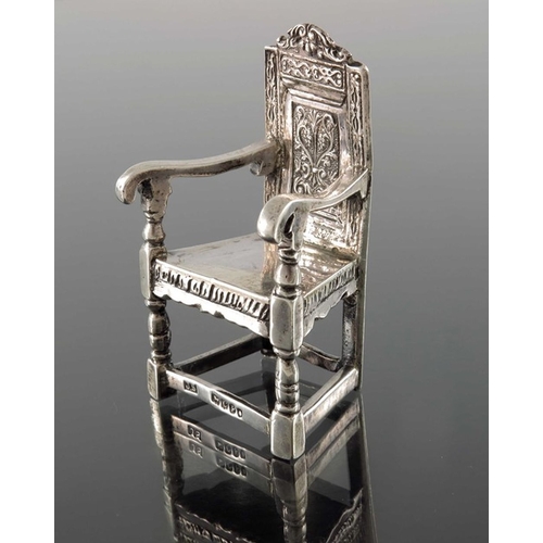 162 - A Victorian silver miniature chair, John Smith, London 1898, modelled as Shakespeare's armchair, Ger... 