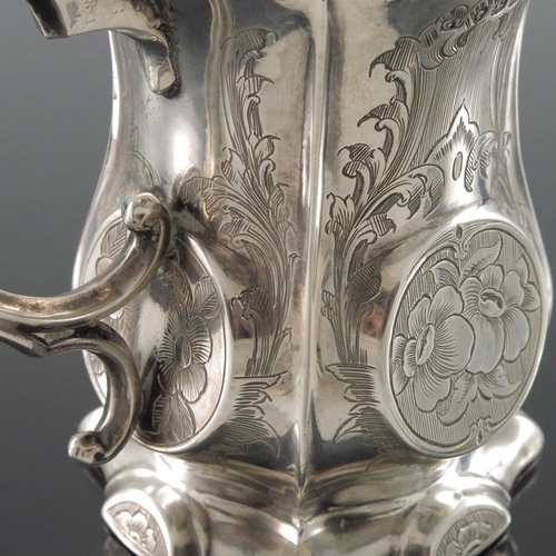 163 - A Victorian silver mug, George Unite, Birmingham 1859, footed ribbed baluster form, circular medalli... 