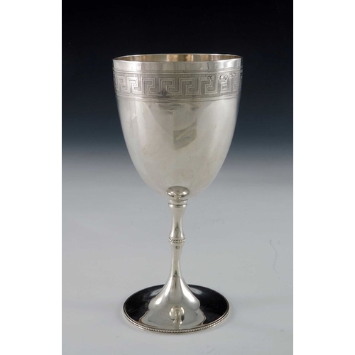 165 - A Victorian  silver goblet, Thomas Smily, London 1868, the rounded bowl etched and chased with Greek... 