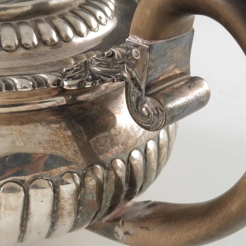 168 - A George III silver teapot on stand, J E Terrey and Co., London 1817, squat ovoid form, half reeded,... 