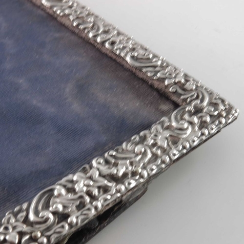 172 - A Victorian silver photo frame, Deakin and Francis, Birmingham 1898, embossed and reticulated floral... 