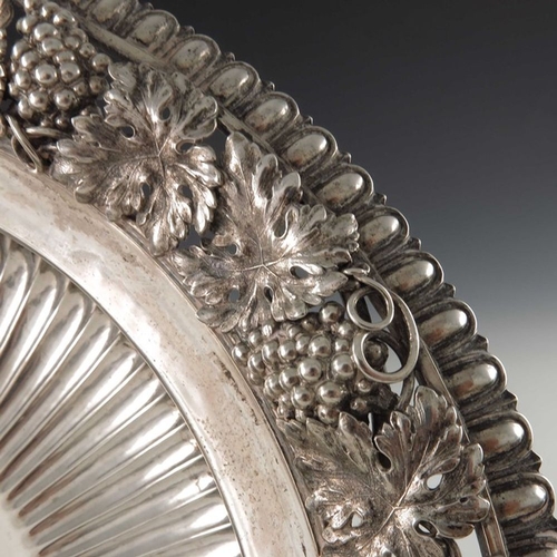 182 - A George III silver bowl, William Elliott, London 1817, squat Campana form, reeded, with a wide ever... 