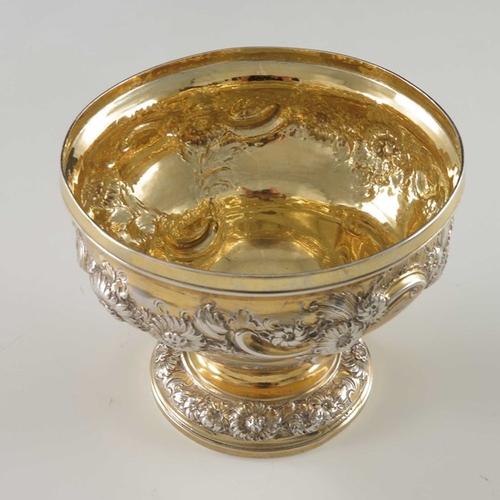 184 - A George II silver gilt sugar box, Samuel Taylor, London 1751, pedestal ogee form, embossed and chas... 