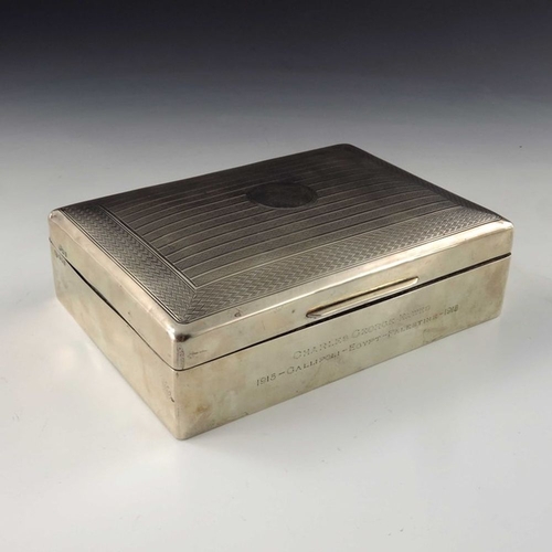 188 - A George V silver cigar box, Goldsmiths and Silversmiths Company, London 1918, cushioned cuboid form... 