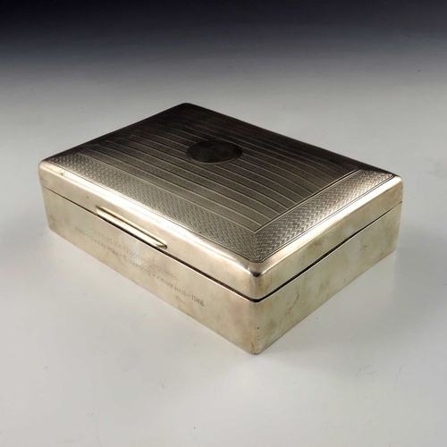 188 - A George V silver cigar box, Goldsmiths and Silversmiths Company, London 1918, cushioned cuboid form... 