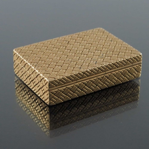 199 - Van Cleef and Arpels, New York, an 18 carat gold pill box, cuboid form, embossed rattan effect, hing... 