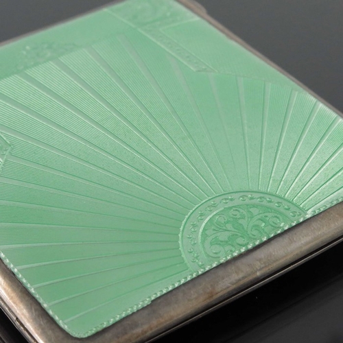 202 - A George VI silver and enamelled cigarette case, Birmingham 1936, rectangular cushioned with green g... 