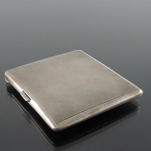 202 - A George VI silver and enamelled cigarette case, Birmingham 1936, rectangular cushioned with green g... 