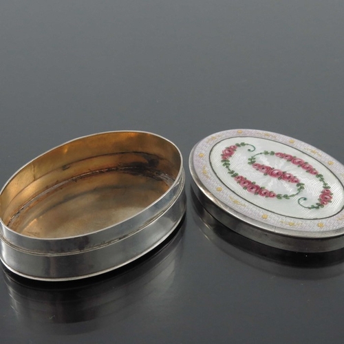 206 - An Austrian silver and enamelled snuff box, import marks Saunders and Shepherd, London 1911, oval fo... 