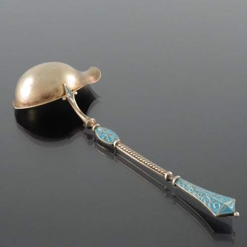 207 - David Andersen, a Norwegian silver gilt and enamelled ladle, circa 1900, the handle with foliate scr... 