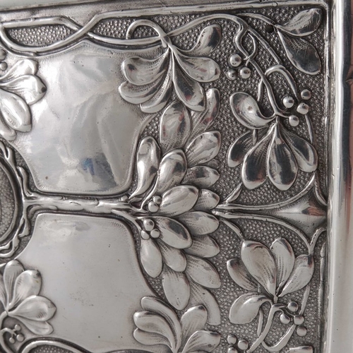 218 - A Jugendstil silver plated cigar box, circa 1900, cuboid form, embossed with stylised trees and sinu... 