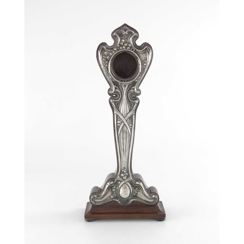 219 - An Arts and Crafts silver and walnut clock case, W J Myatt and Co., Chester 1908, the stylised ogee ... 