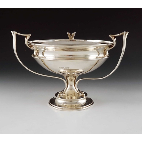 221 - An Arts and Crafts silver pedestal bowl, Joseph Rodgers, Sheffield 1907, the ogee rimmed bowl with t... 