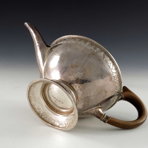 223 - Bernard Cuzner for Liberty and Co., an Arts and Crafts silver teapot, William Hair Haseler, Birmingh... 