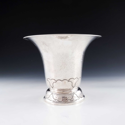 227 - Carl Gustaf Hjulstrom, an Art Deco Swedish silver vase, Stockholm 1926, footed trumpet form, planish... 